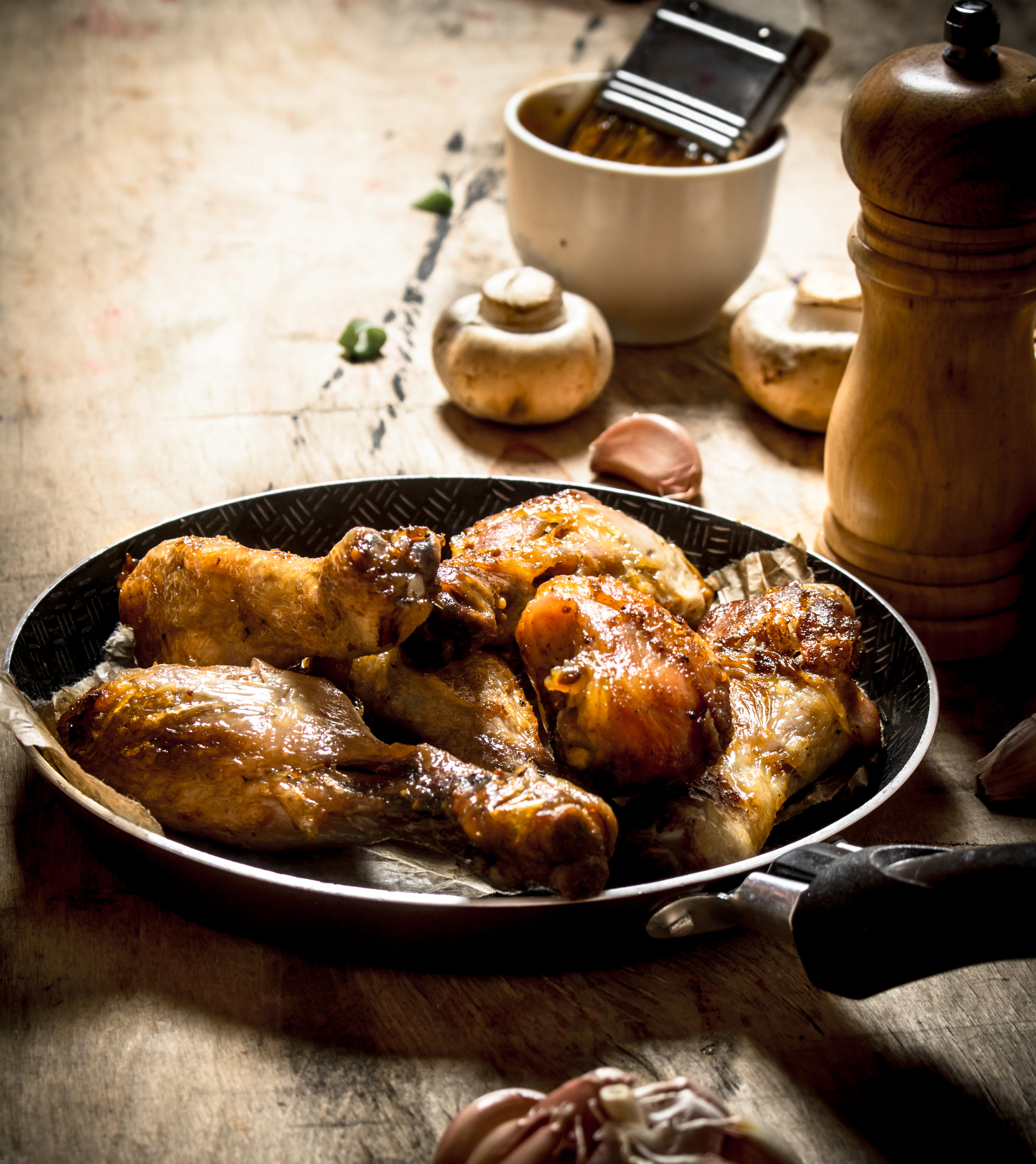 Fried Chicken Legs in Pan with Tomato Sauce